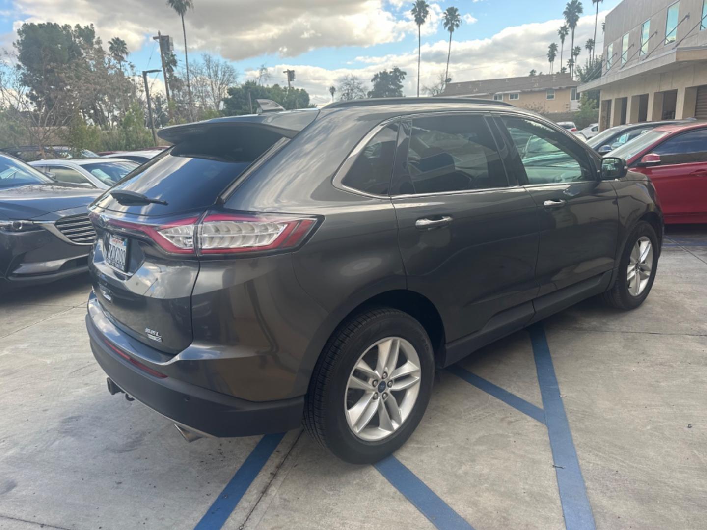 2016 Gray /Black Ford Edge SEL AWD (2FMPK4J93GB) with an 2.0L L4 DOHC 16V engine, 6A transmission, located at 30 S. Berkeley Avenue, Pasadena, CA, 91107, (626) 248-7567, 34.145447, -118.109398 - Low Miles! - Photo#4